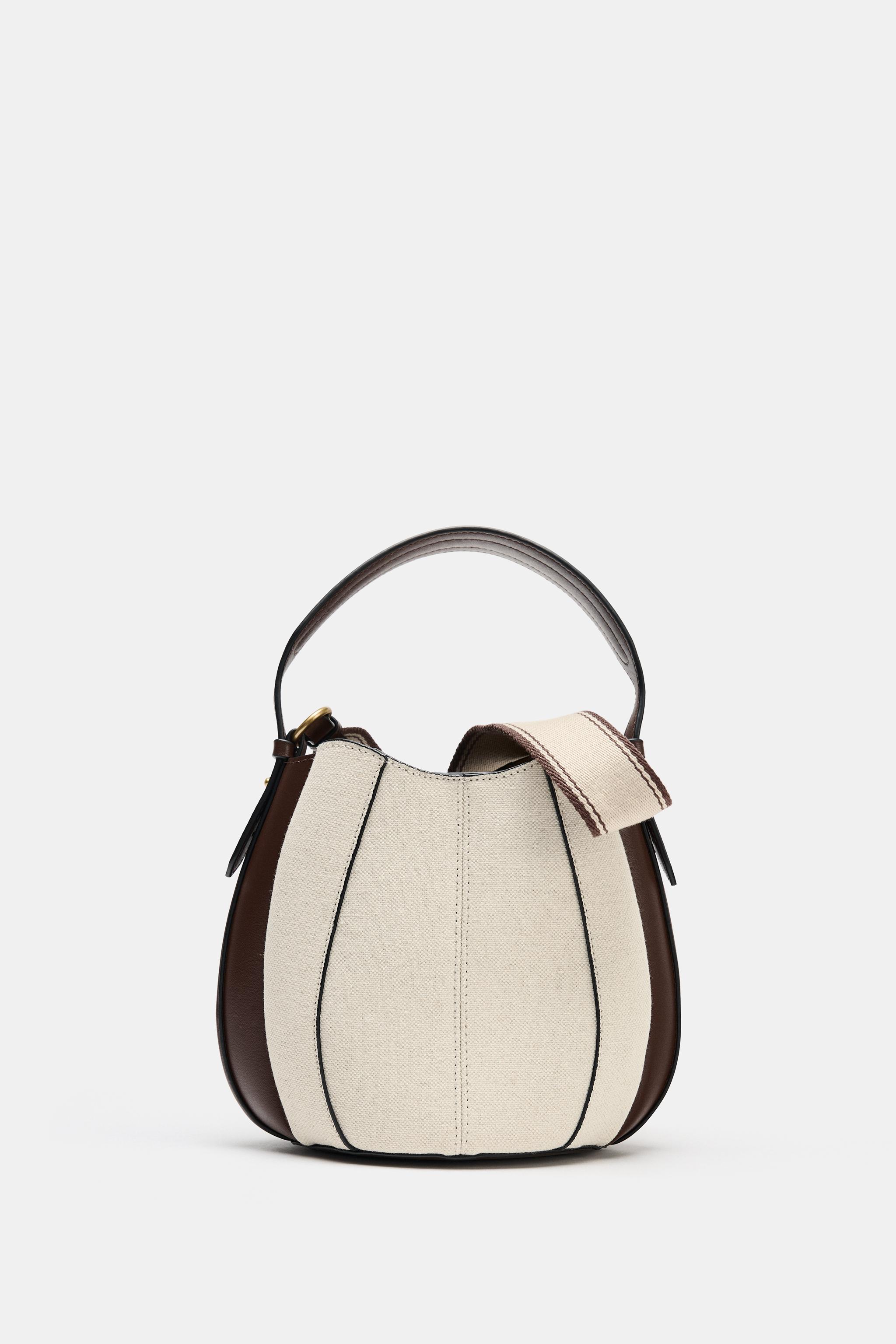 TOPSTITCHED BUCKET BAG